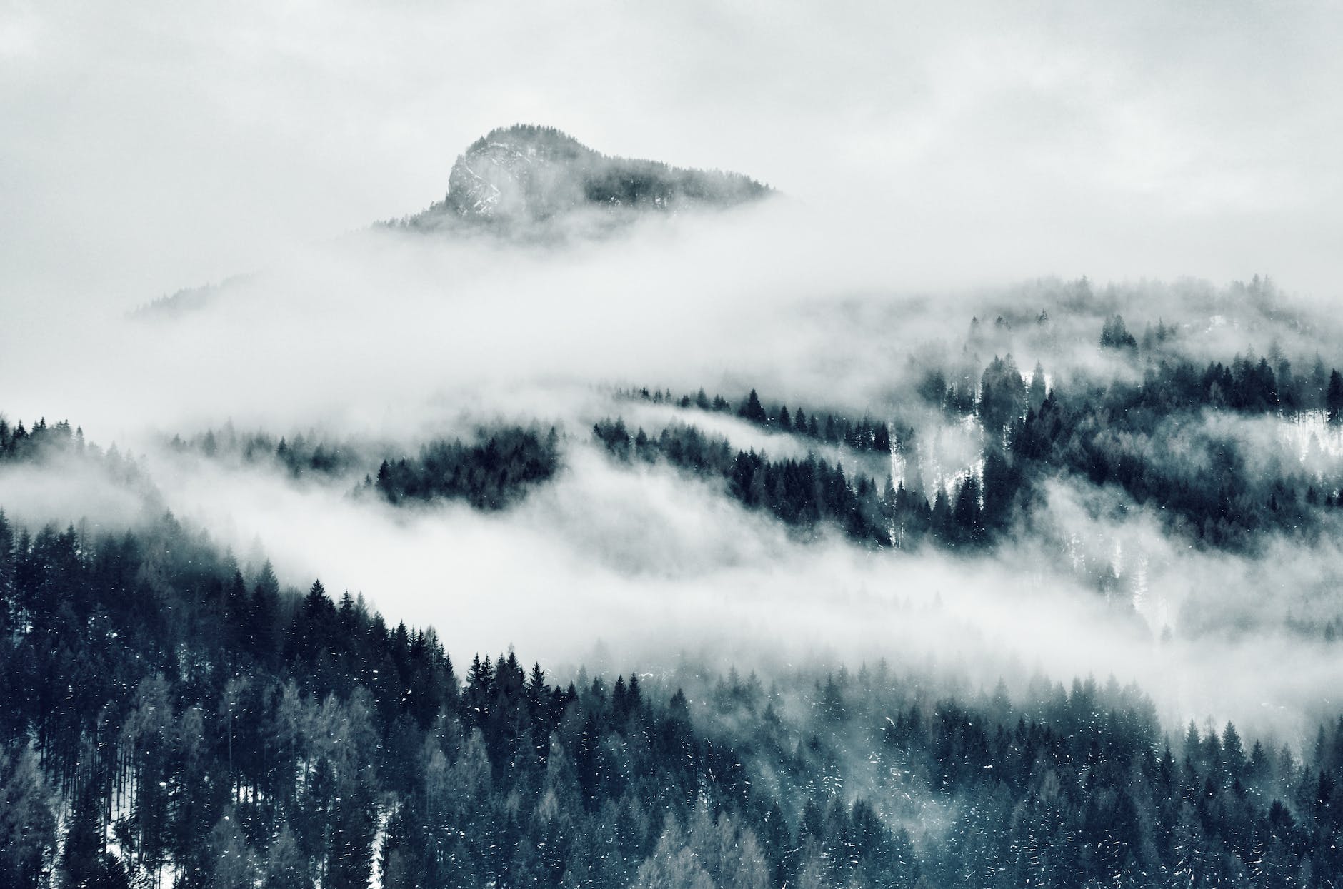 high angle photo of mountain cover with clouds